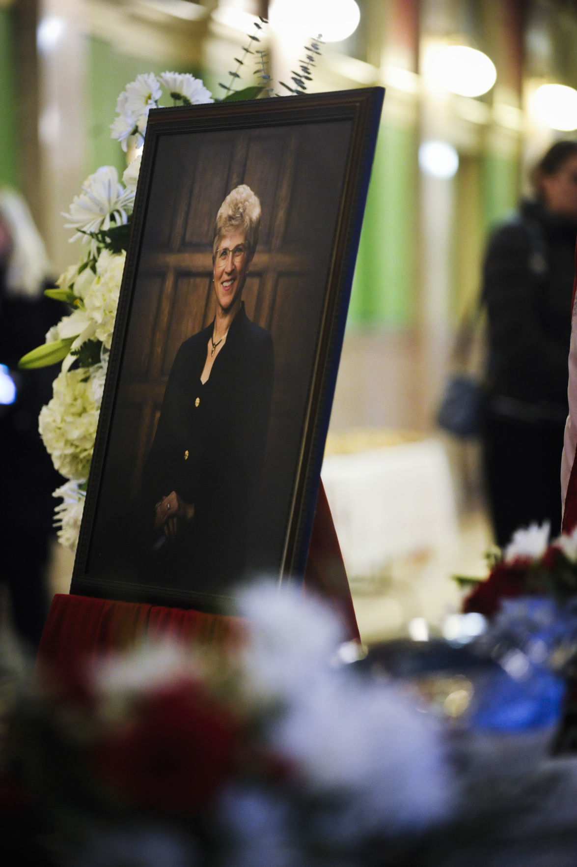 A portrait of Martz next to her ashes.
